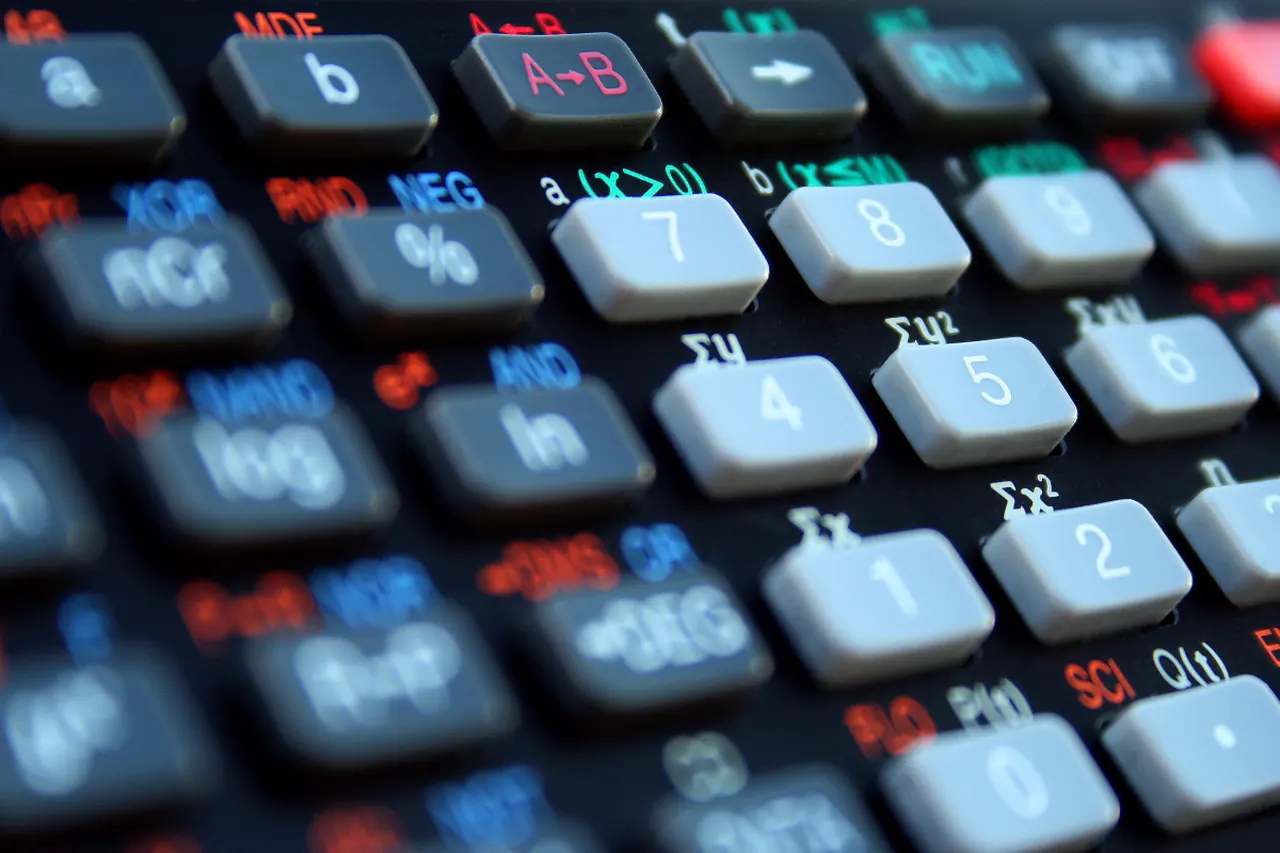 The keypad of a scientific calculator in close-up